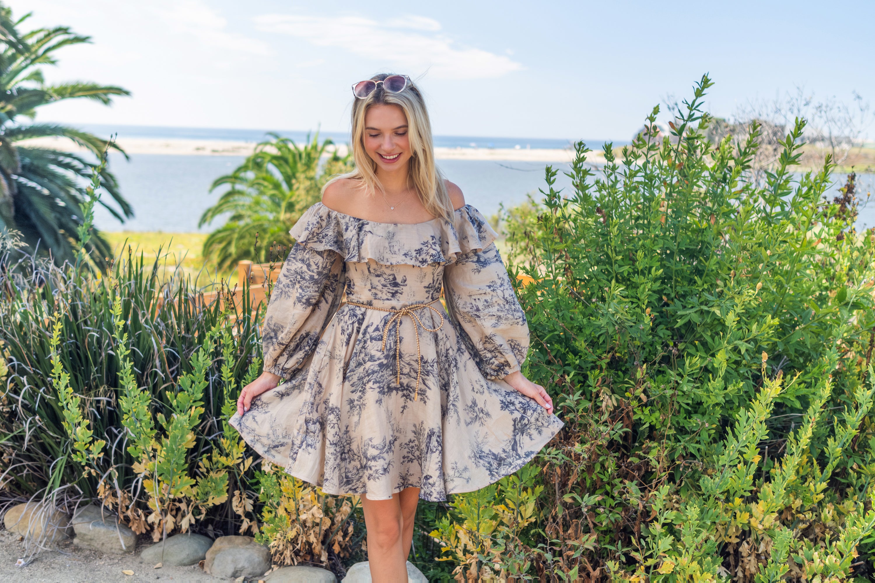 Ruffle neck
Lantern long sleeves
Drawstring Tie 
Pleated Waist
Fitted Cuffs
Fit and Flare Mini Dress