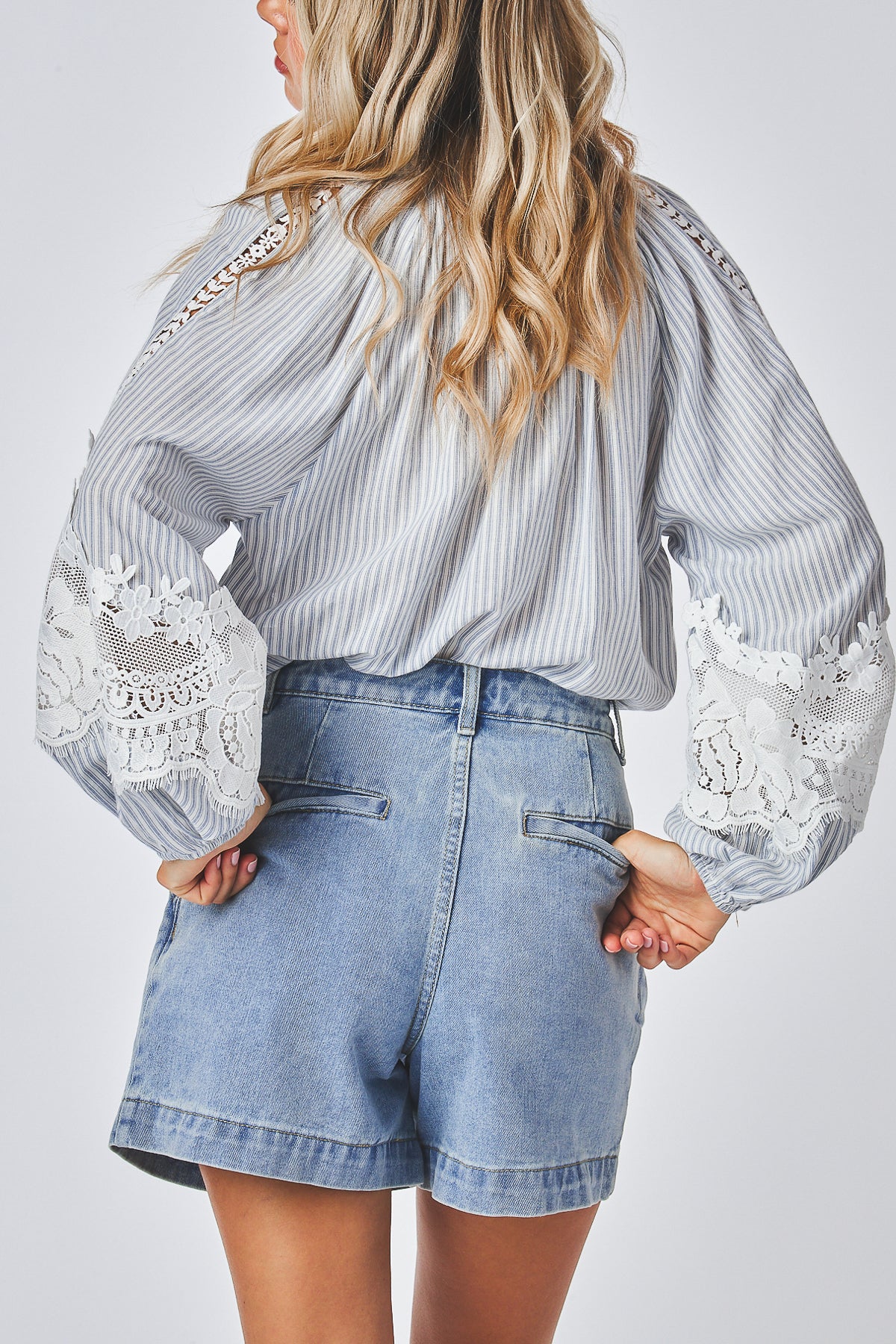 Vintage-inspired lace blouse
Sophisticated high neckline blouse
