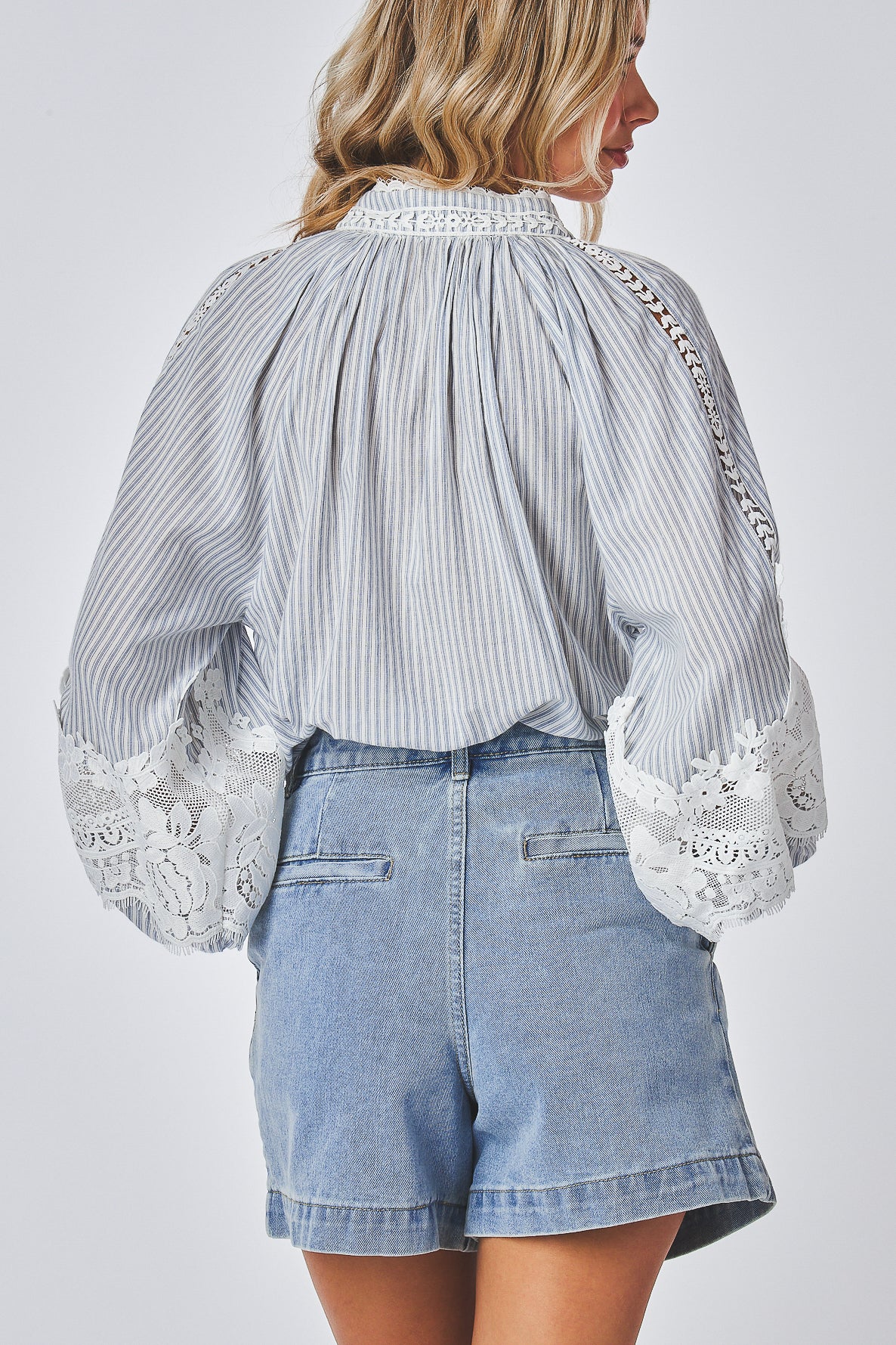 Lace accent blouse for women
Long sleeve lace detail blouse
Romantic lace trim shirt
Lightweight lace insert blouse
Stylish button-up lace blouse