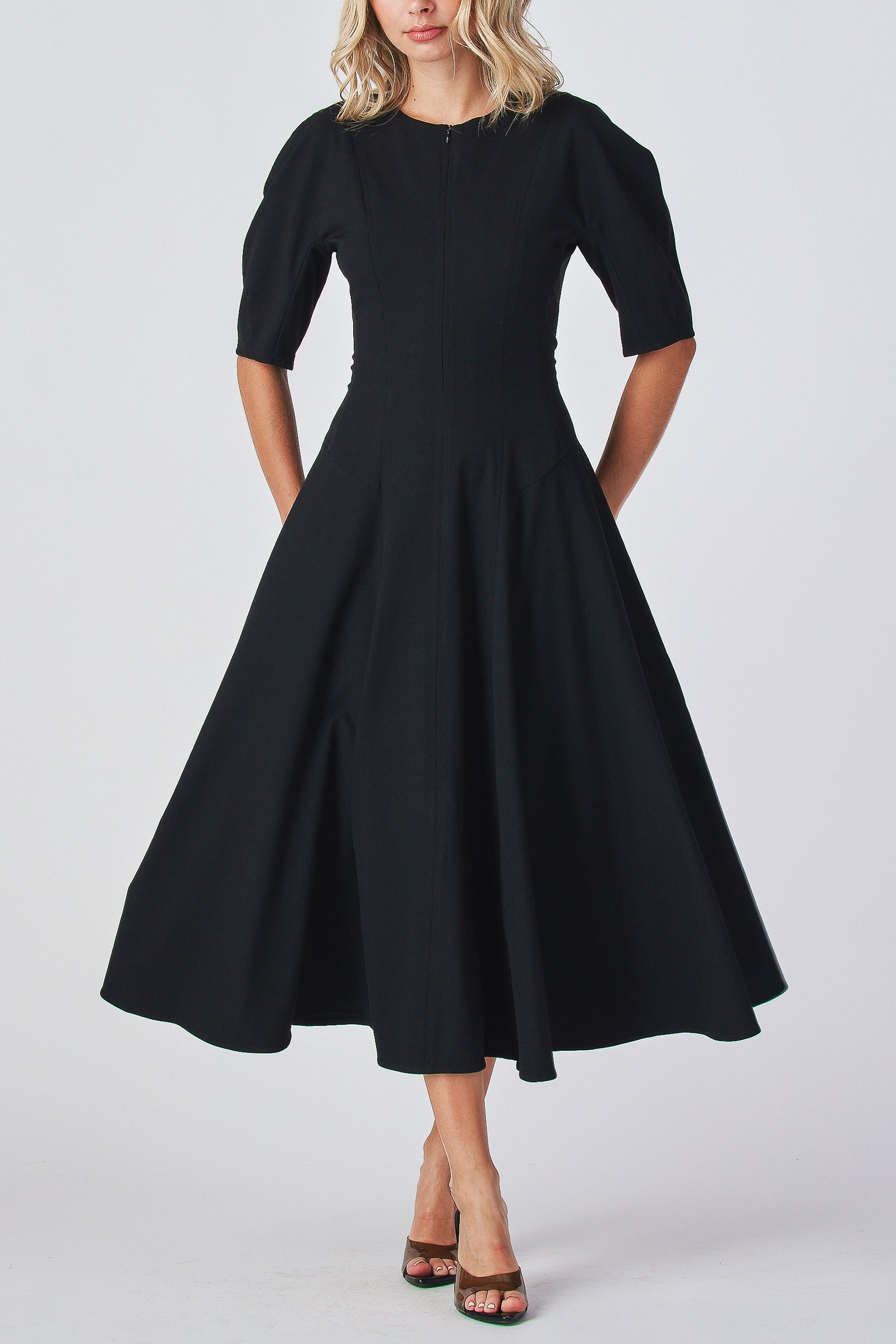 Black dress Round neckline dress
Collarless midi dress

