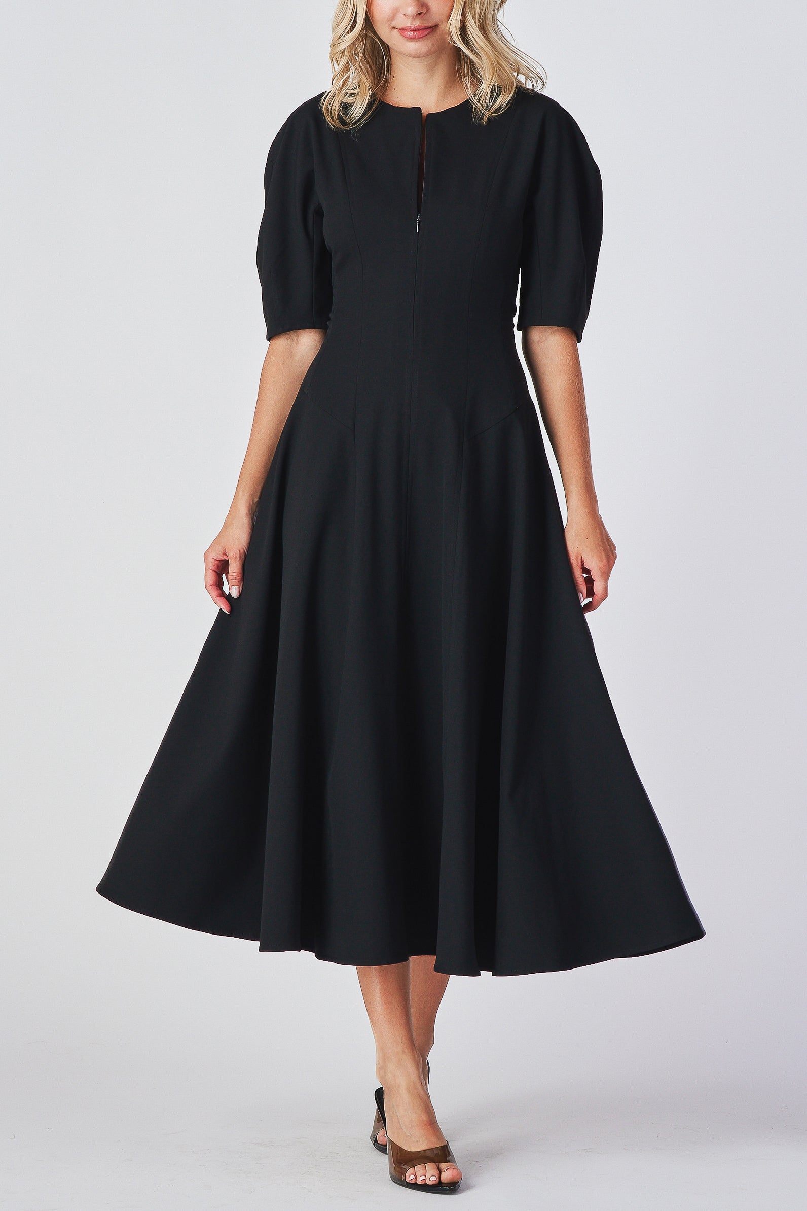 Black dress Front and back zipper dress
Elegant fit and flare dress
