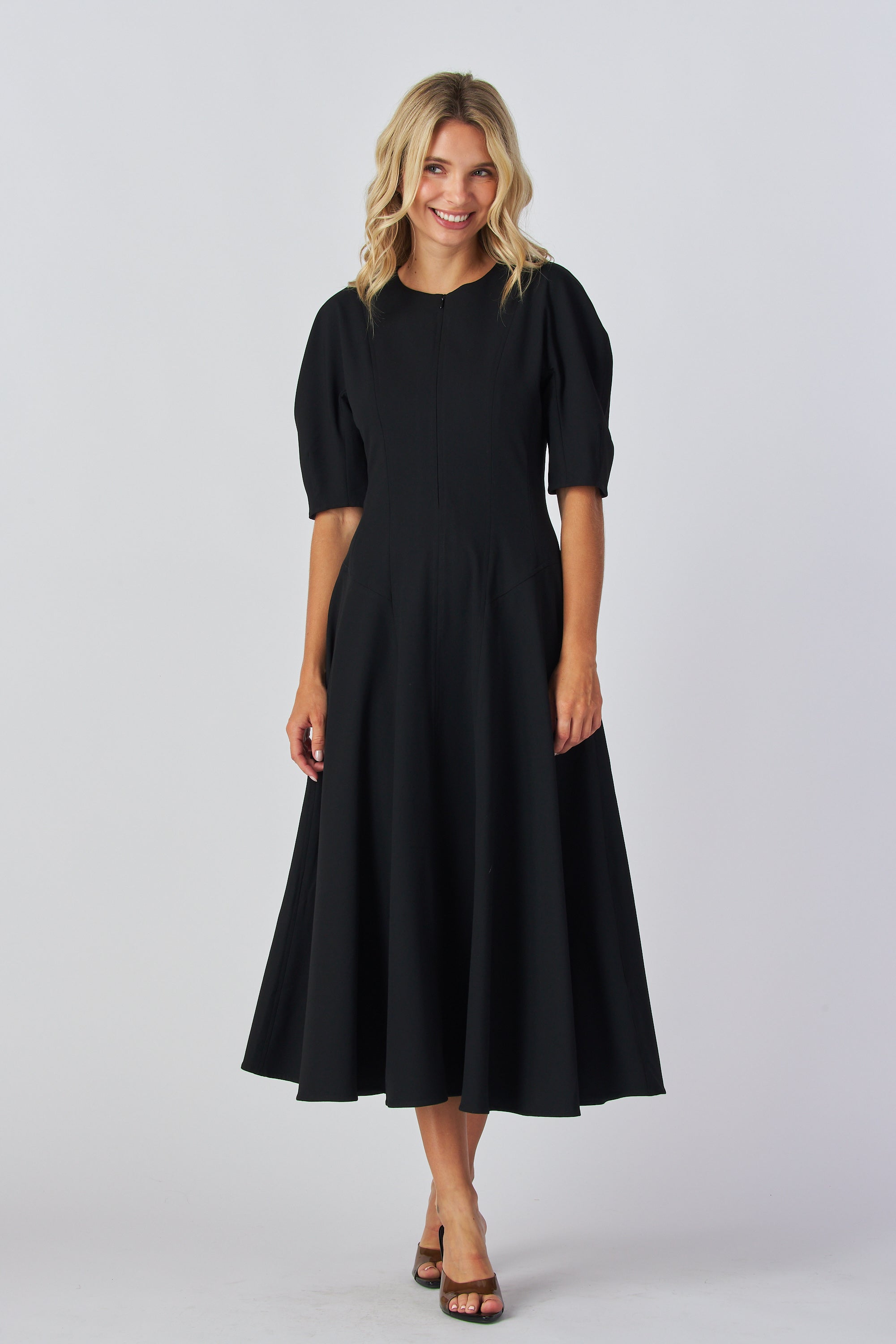 Fit and flare midi dress
Short sleeve midi dress
Round neckline dress
Collarless midi dress
Front and back zipper dress