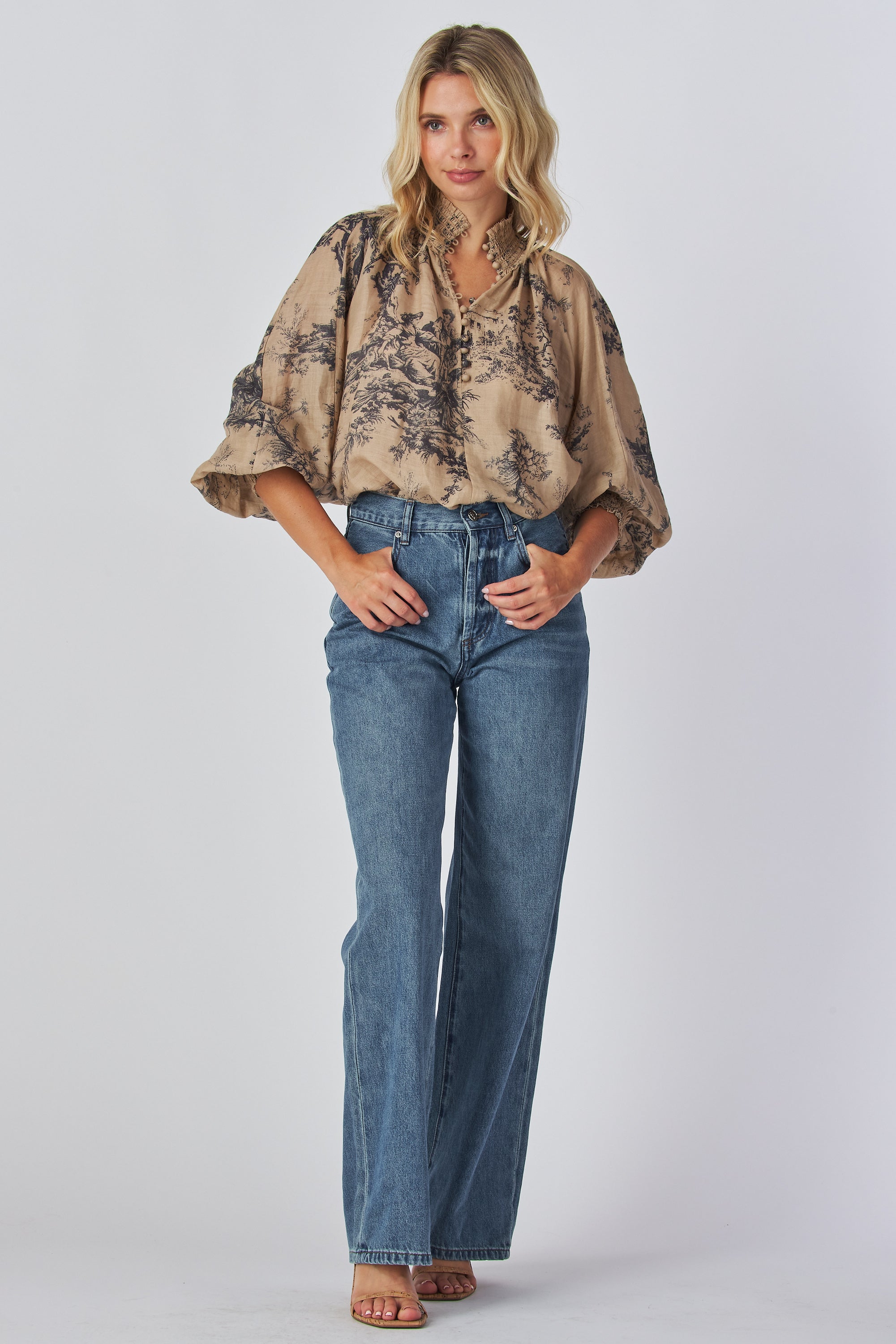 Bohemian band neck
Button up detail
Lace trim allover
Puff sleeves fitted cuffs
Loose fit top
100% Ramie