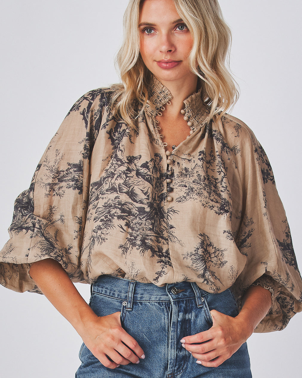 Bohemian band neck
Button up detail
Lace trim allover
Puff sleeves fitted cuffs
Loose fit top
100% Ramie