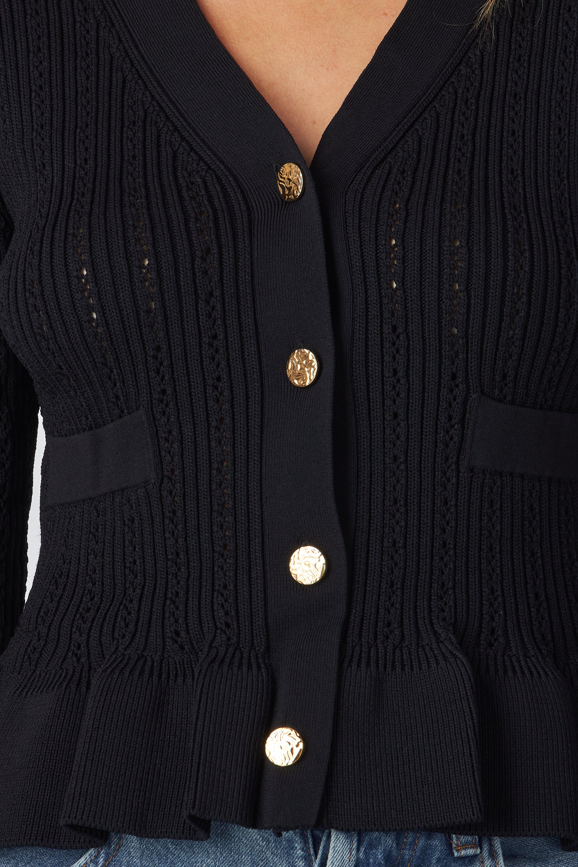 Long sleeve knit blouse
V-neck ruffle blouse
Ruffle hem knit top
Button front knit blouse
Knit ruffle cuff top