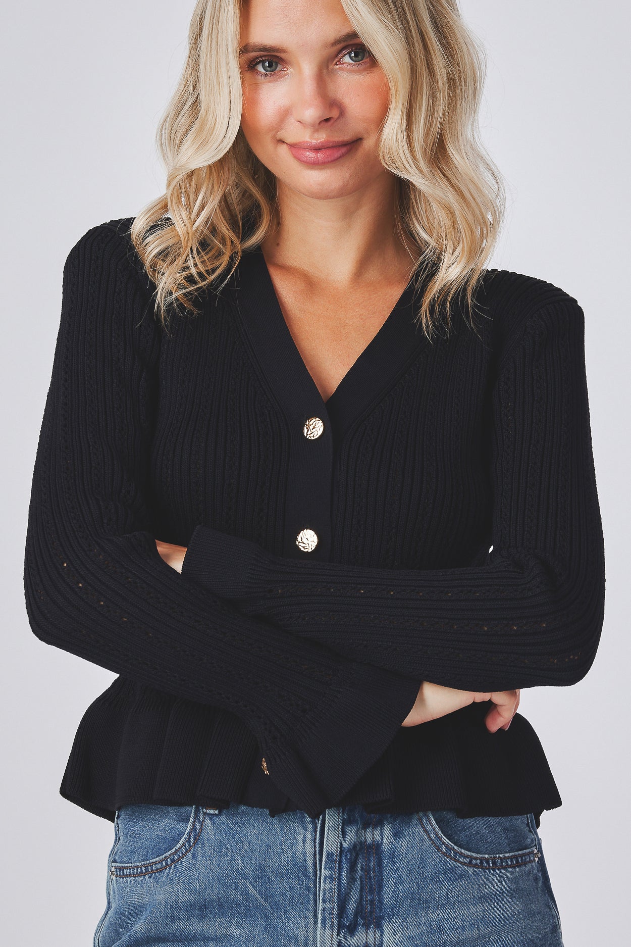 Ruffle cuff and hem
Button up
