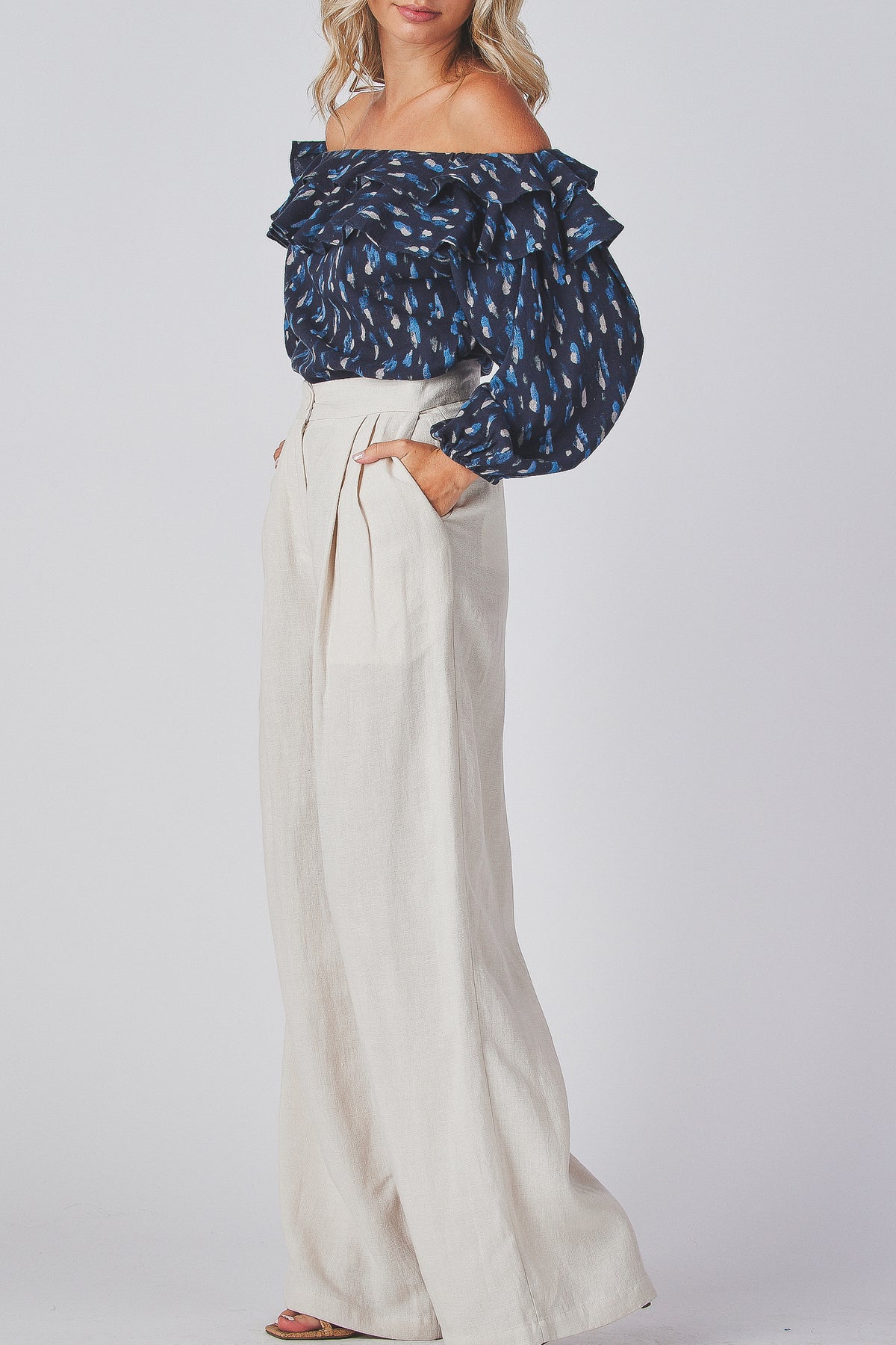 Grazia Top navy print top side view with the full lantern sleeve