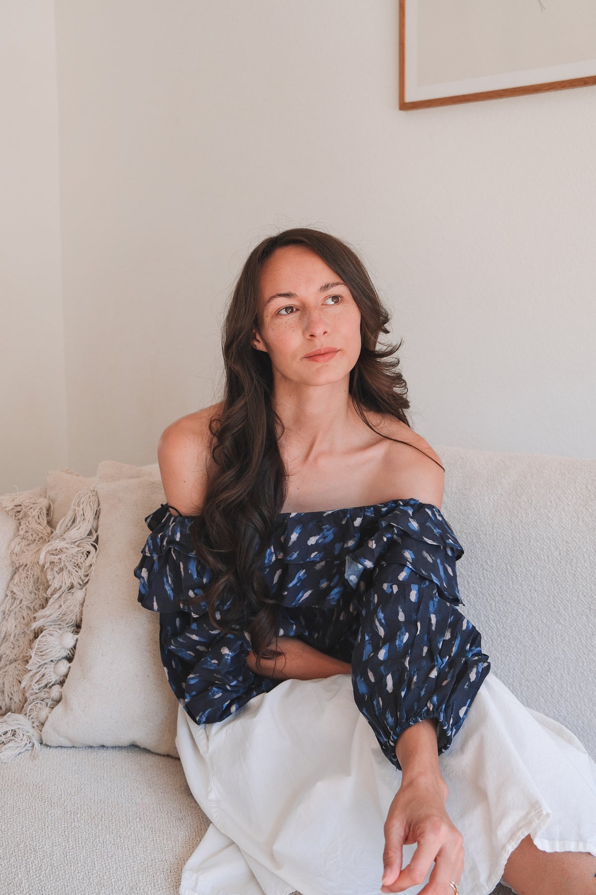 Grazia Top navy off shoulder top worn seated