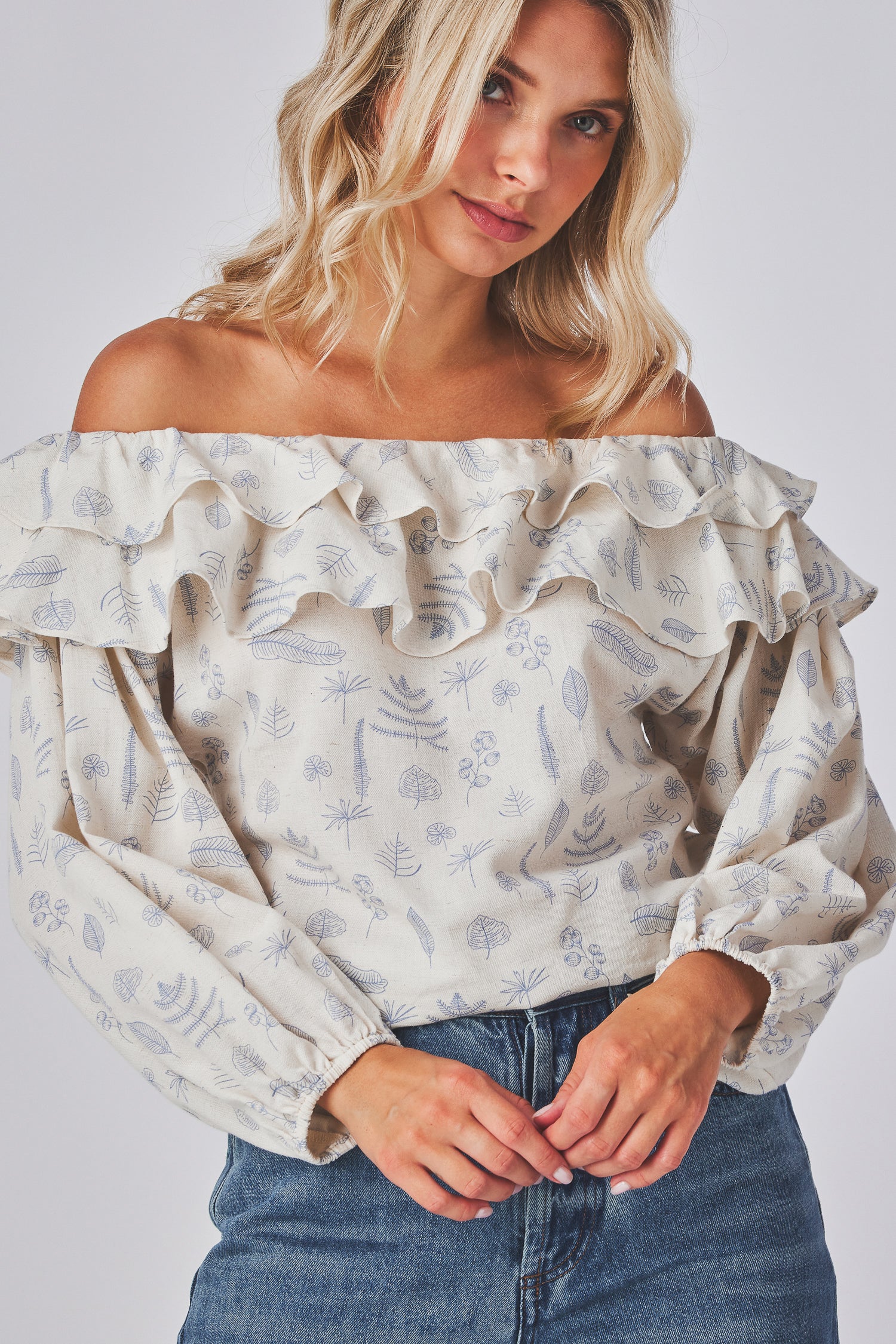 Ethereal Elegance Off-Shoulder Top Featuring Lantern Sleeves, Tailored Cuffs, and a Relaxed Bohemian Silhouette