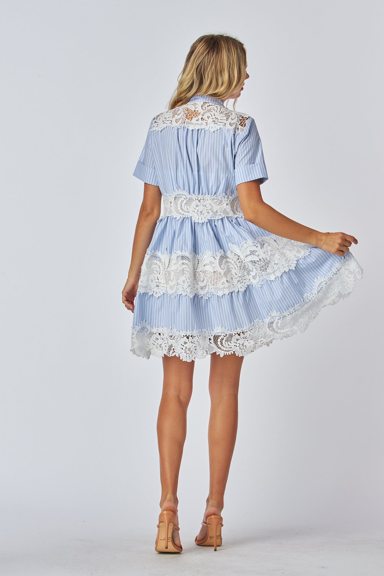 Band collar
Short sleeves
Button up details
Layered lace blend
Stripe mini dress