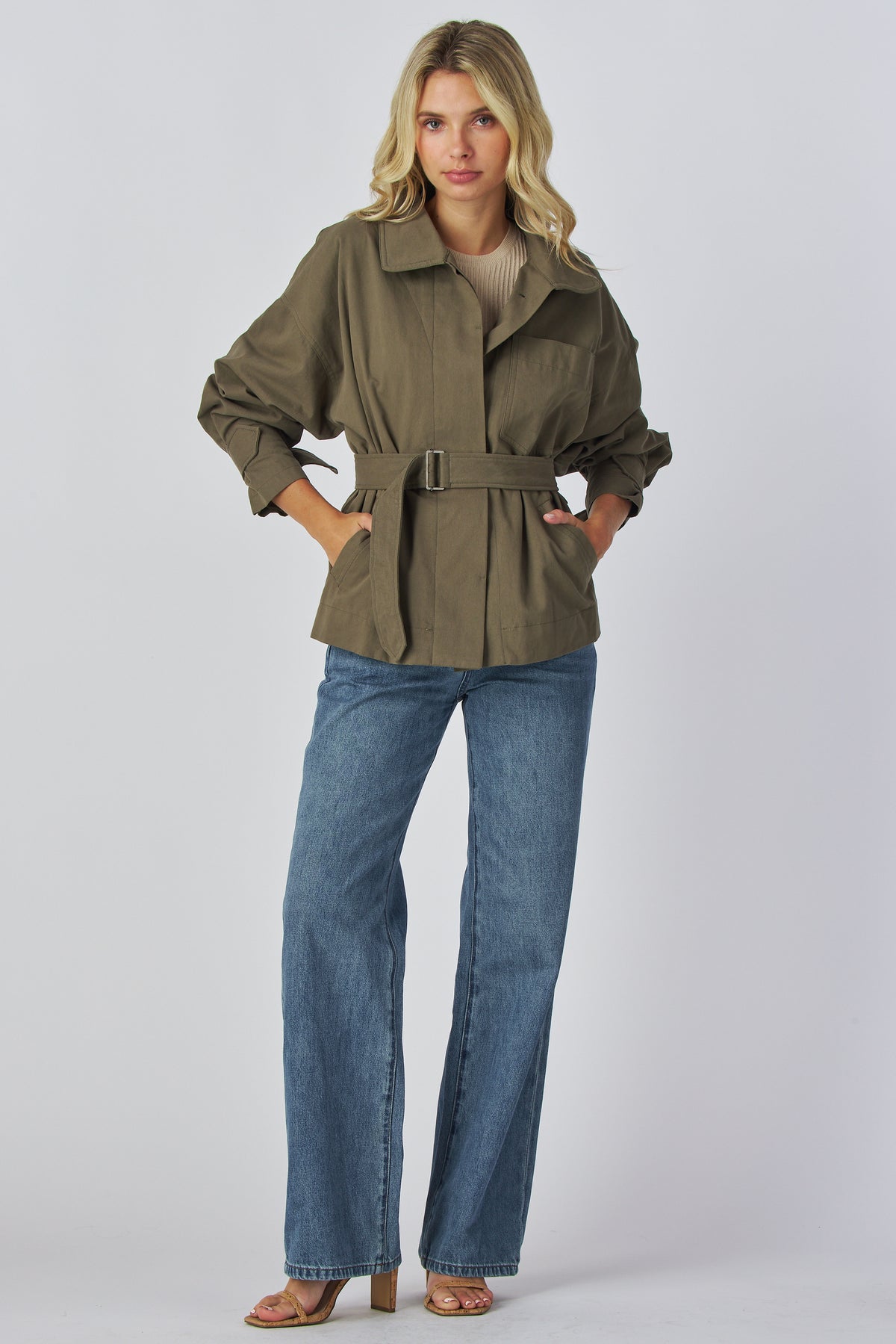 Linden Jacket in olive worn with denim, full length front view