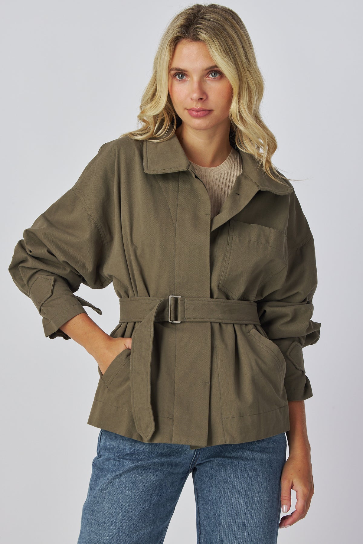 Linden Jacket in olive cotton with shirt collar and self belt, front view