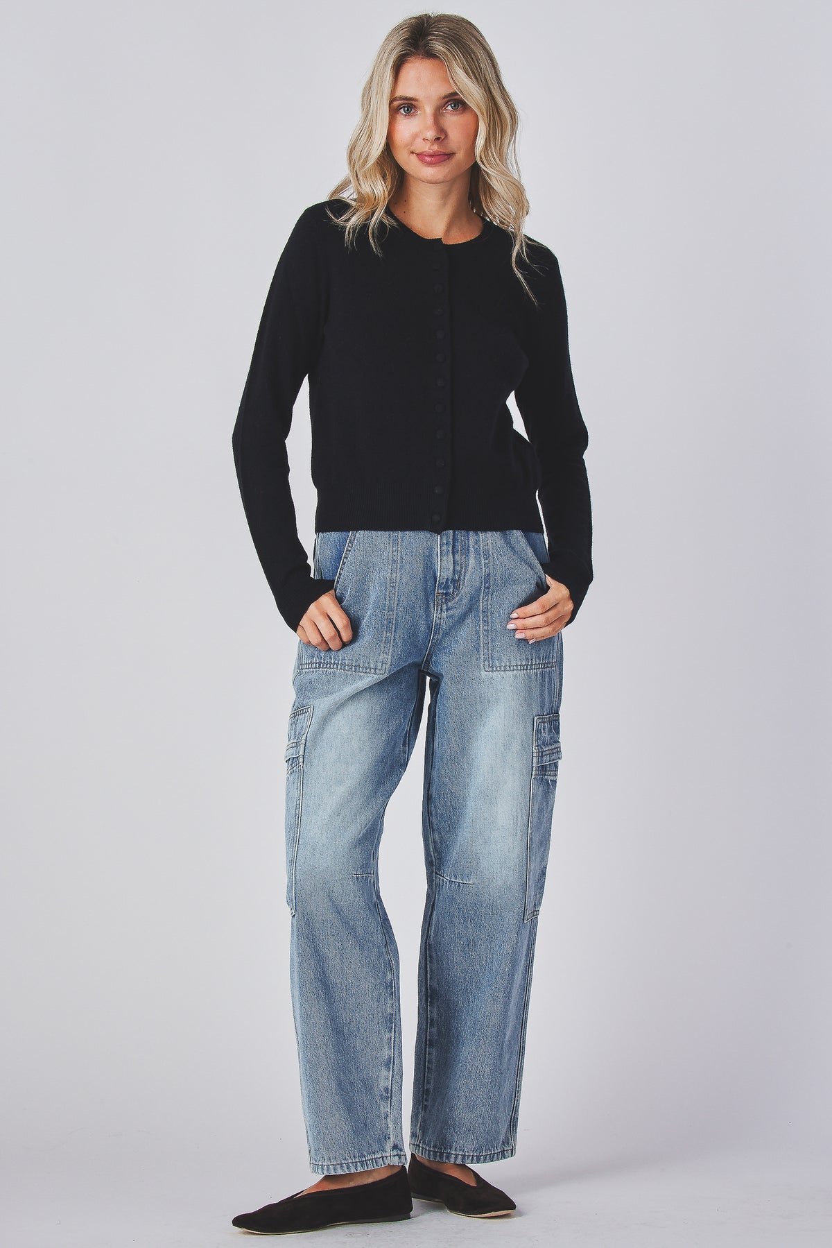 Mabel Cardigan in black worn with denim, full length front view