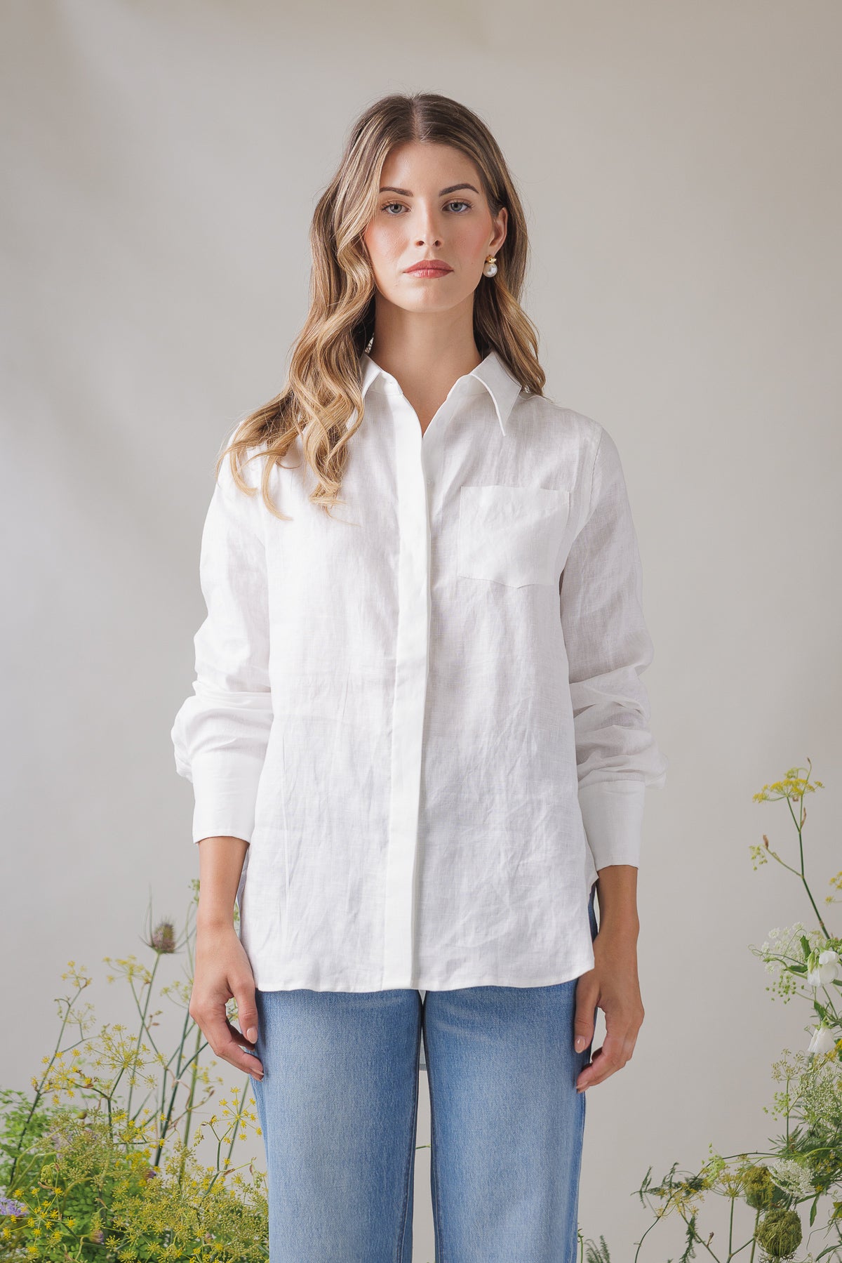 Aries Top white linen shirt front view showing the hidden button placket and chest pocket