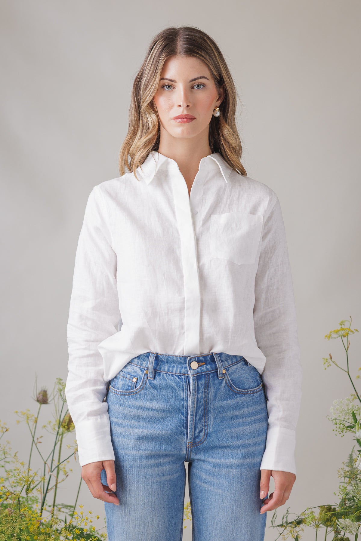 Aries Top white linen shirt front view half tucked into jeans